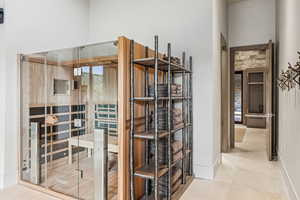 Spacious closet featuring tile patterned floors