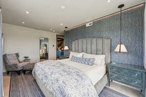 Tiled bedroom featuring recessed lighting