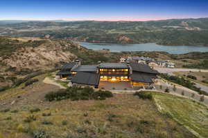View of property location featuring a water and mountain view