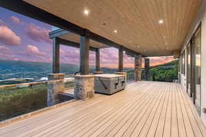 Deck at dusk with a mountain view