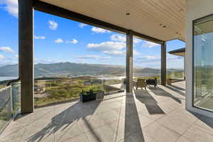 View of patio with a mountain view