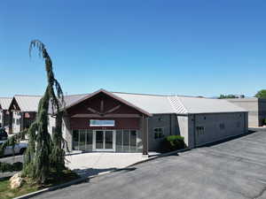 View of front facade with a metal roof