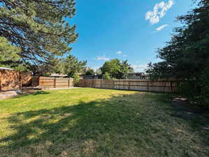 View of fenced backyard