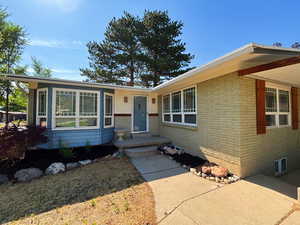View of front of house with brick siding
