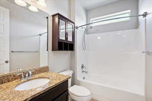 Full bath with vanity and bathing tub / shower combination