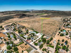 View of property location featuring a mountainous background and rural landscape