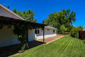 View of yard with a patio area