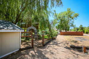 View of yard featuring a gate