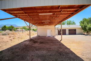 Garage featuring a mountain view