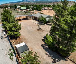 View of subject property with a mountainous background