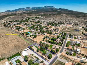 Aerial overview of property's location with mountains and property parcel outlined