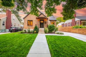 Tudor house featuring brick siding