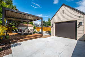 Detached garage featuring driveway