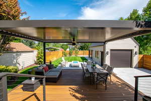 Wooden terrace featuring an outdoor hangout area and outdoor dining area