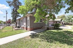 View of front of property with brick siding