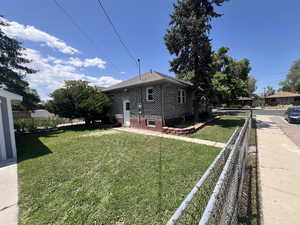 View of side of property with brick siding