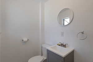 Bath featuring vanity and toilet