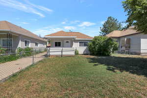 View of front facade with roof with shingles