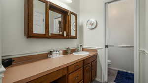 Master bathroom with vanity and large countertop