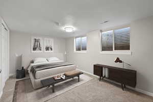 Bedroom with carpet flooring and a closet