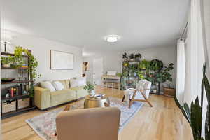 Living room featuring wood finished floors