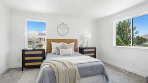 Bedroom with carpet floors and ornamental molding