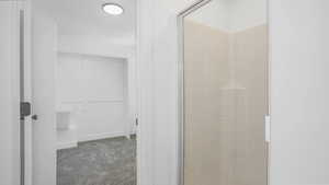 Bathroom featuring a shower stall