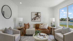 Living room featuring wood finished floors, healthy amount of natural light, ornamental molding, and recessed lighting