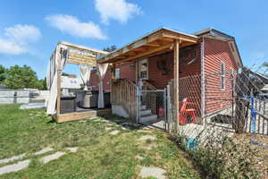 View of front of house featuring a hot tub