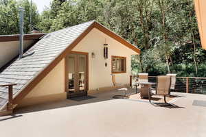 French doors from primary bedroom to balcony