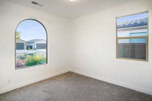 Second bedroom on south/west side of home (left).