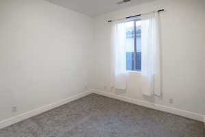 Third bedroom on west side of home (left).