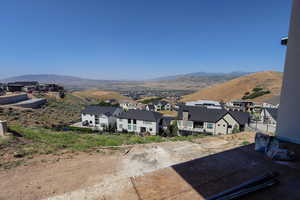 Mountain view featuring nearby suburban area