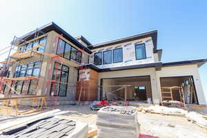 View of front facade with water heater
