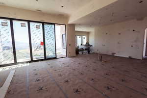 Empty room featuring arched walkways
