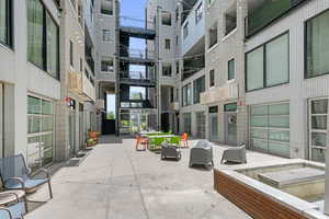 View of home's community featuring a patio