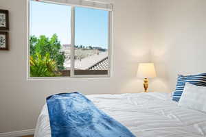 Bedroom featuring views from window