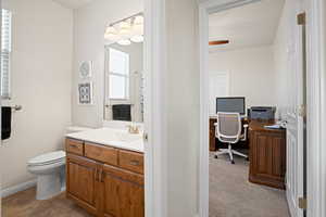 Bathroom with vanity and toilet