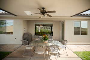 View of patio / terrace featuring ceiling fan and outdoor dining space