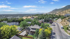 Aerial view of residential area with a mountainous background
