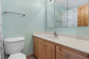 Bathroom with vanity and toilet