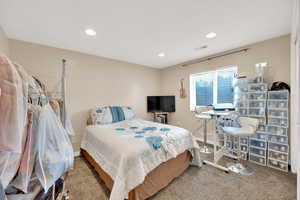 Bedroom featuring carpet flooring and recessed lighting