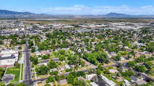 Aerial perspective of suburban area with a mountain backdrop