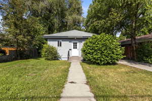 View of property hidden behind natural elements