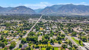 Aerial view of residential area featuring mountains