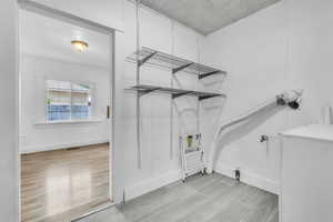 Laundry room with shelves