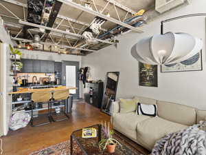 Living area featuring concrete floors