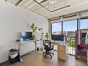 Office space featuring finished concrete floors