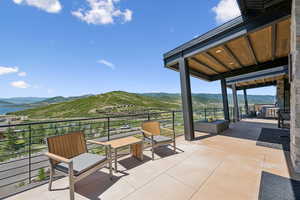 Patio / terrace featuring a mountain view