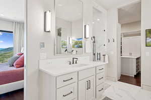 Bathroom with ensuite bath, vanity, a shower stall, recessed lighting, and marble finish floors